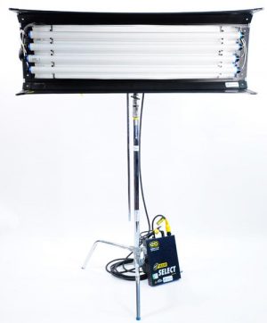 4’x4 Kino Flo with remote ballast leaning against the base of the C-stand